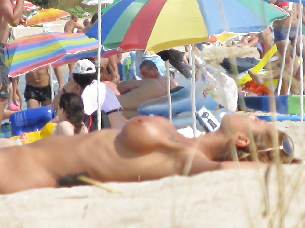 11P More from the faked tits on the beach