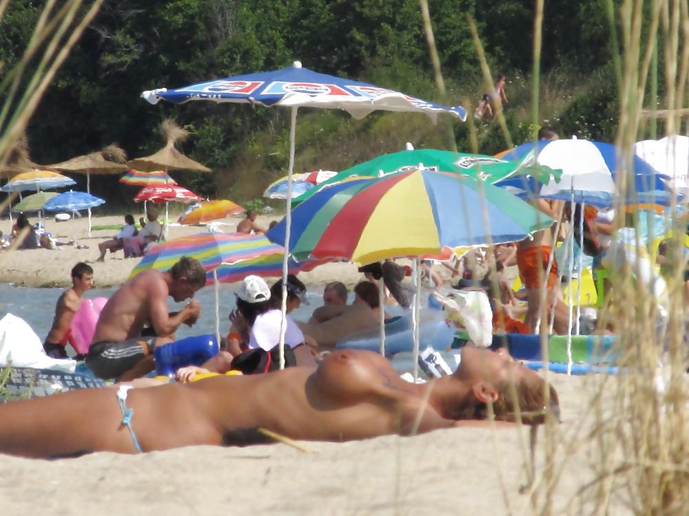11P More from the faked tits on the beach