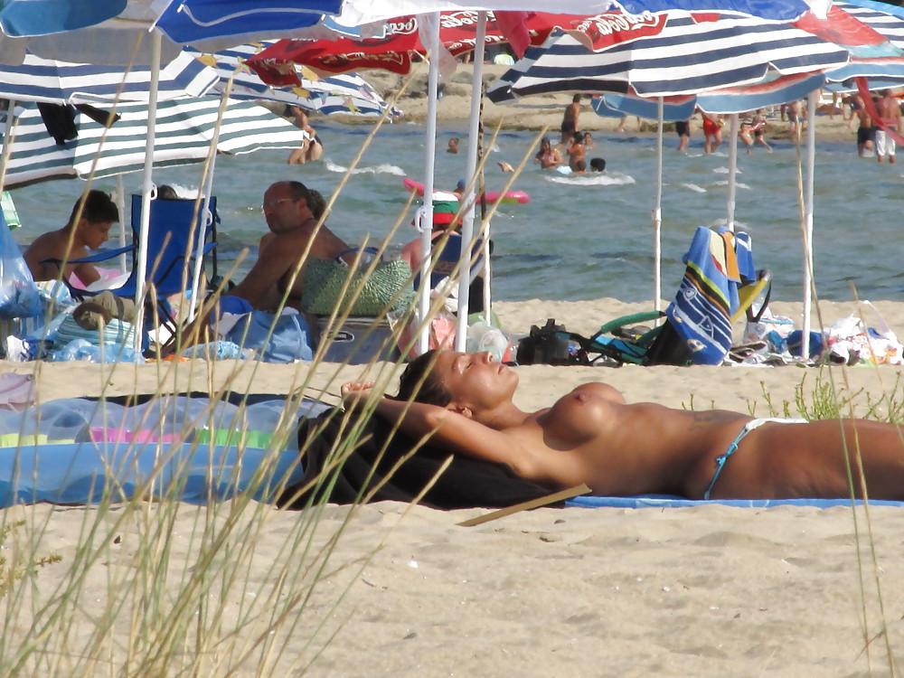 11P More from the faked tits on the beach
