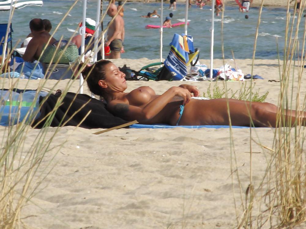 11P More from the faked tits on the beach
