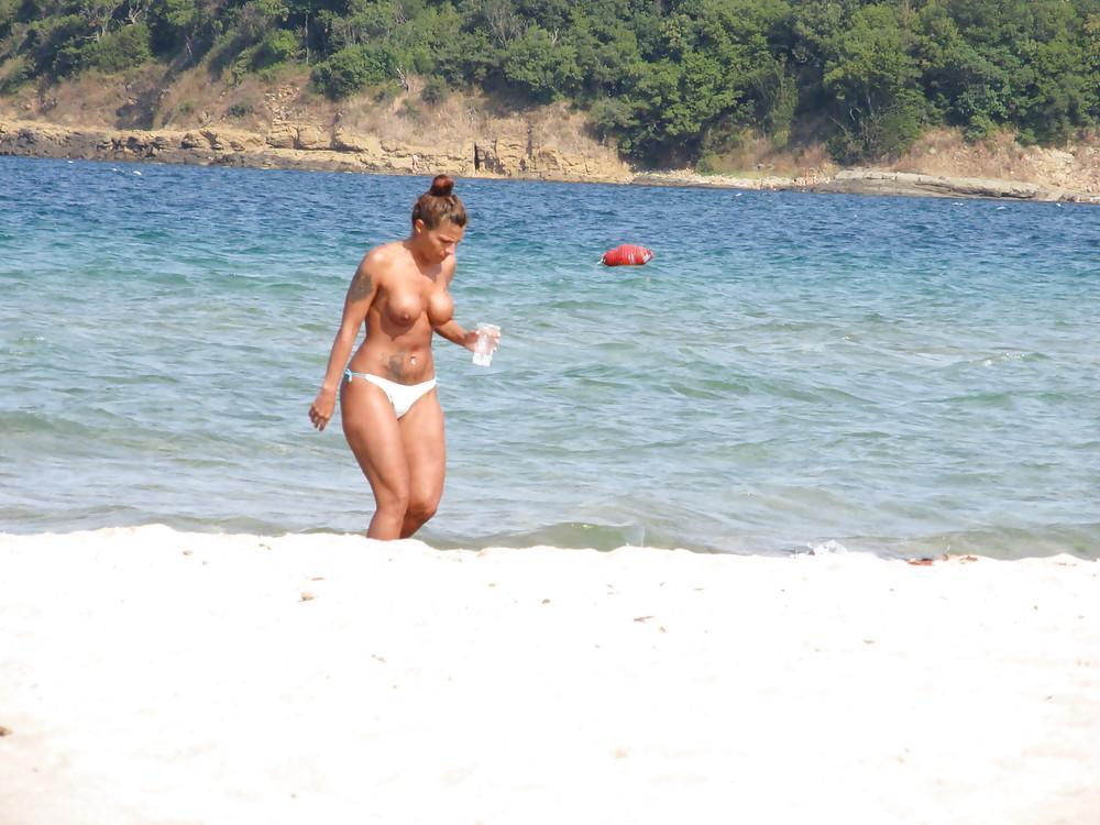 11P More from the faked tits on the beach