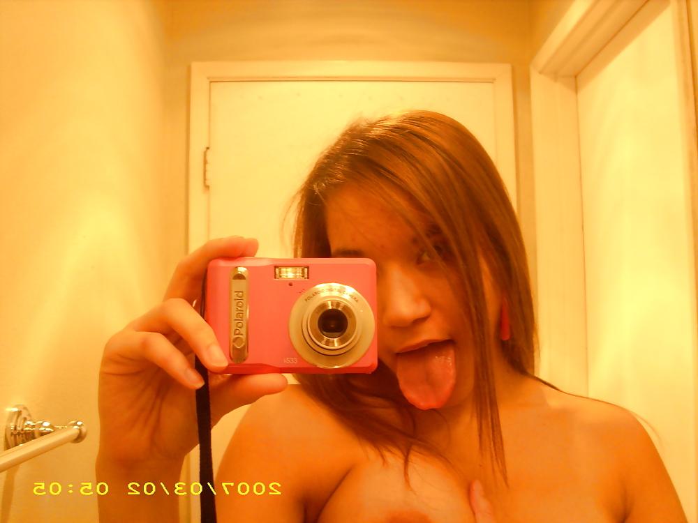18P Petite teen shows her tiny hairy pussy