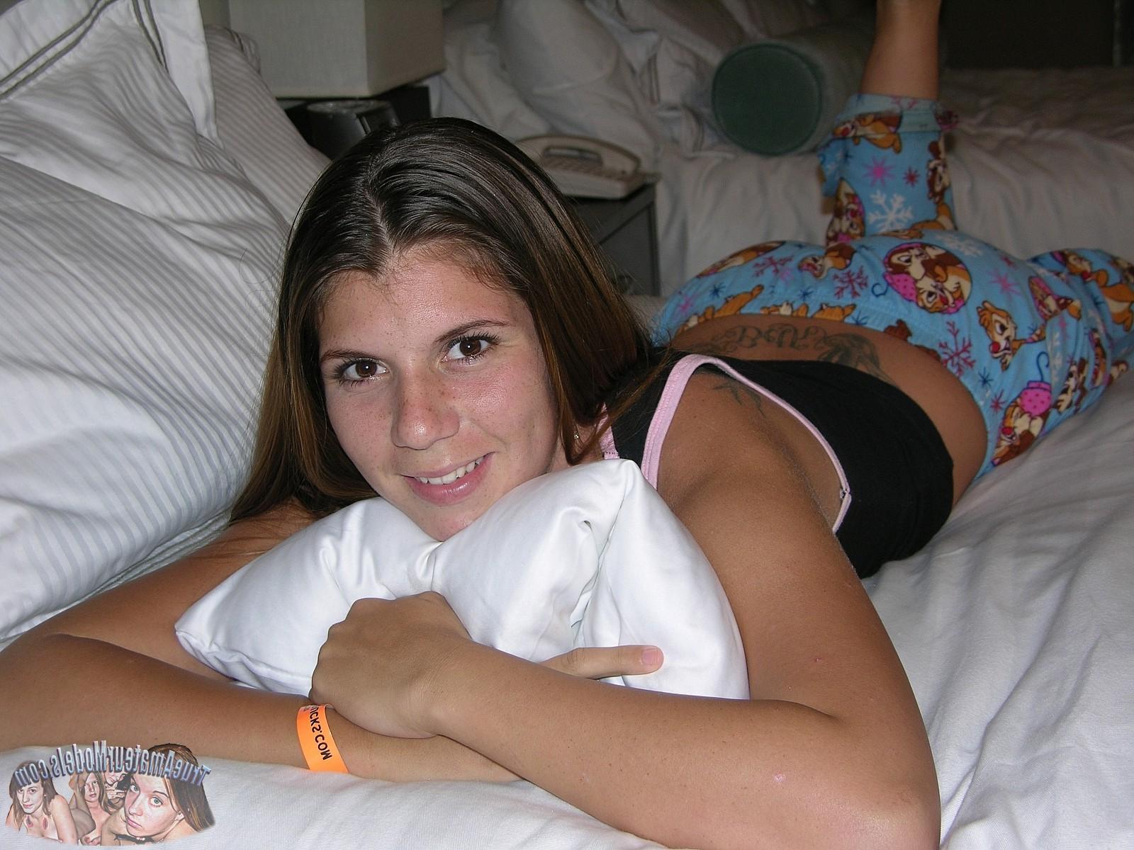 17P Hot Brunette Teen Strips down cartoon pajamas and shows hairy bush
