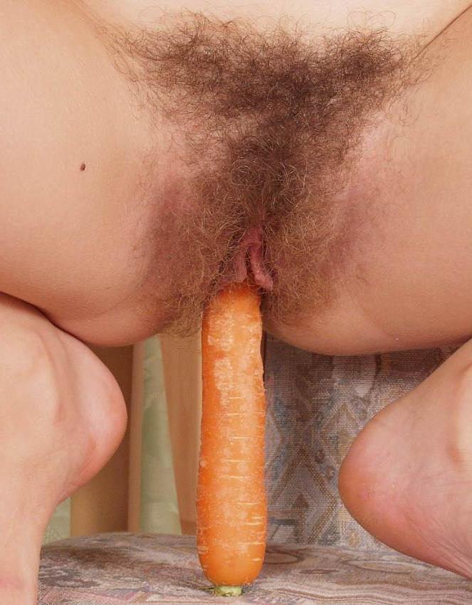 15P teen fucking her hairy pussy with a carrot