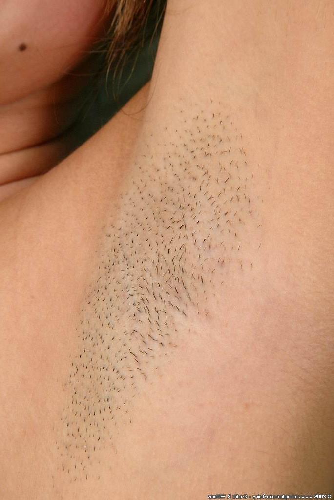 15P cutie spreads her hairy pussy and shows pink