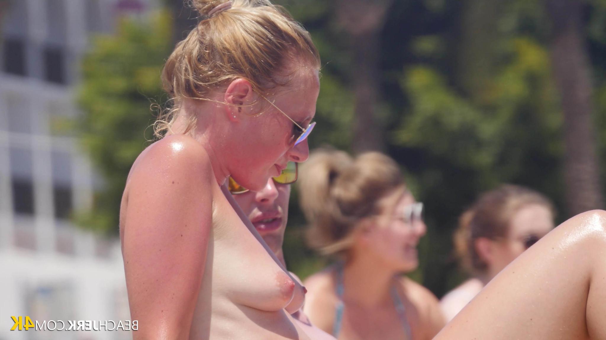 16P hot babe rubbing sun oil into her breast
