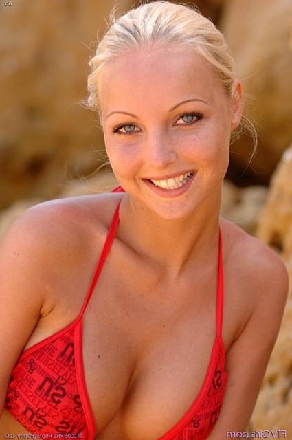 14P Beautiful bikini blonde at beach