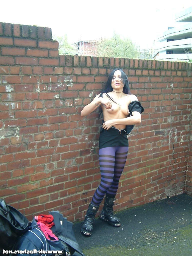 14P Sexy public flasher Isis in red stockings exposes tits