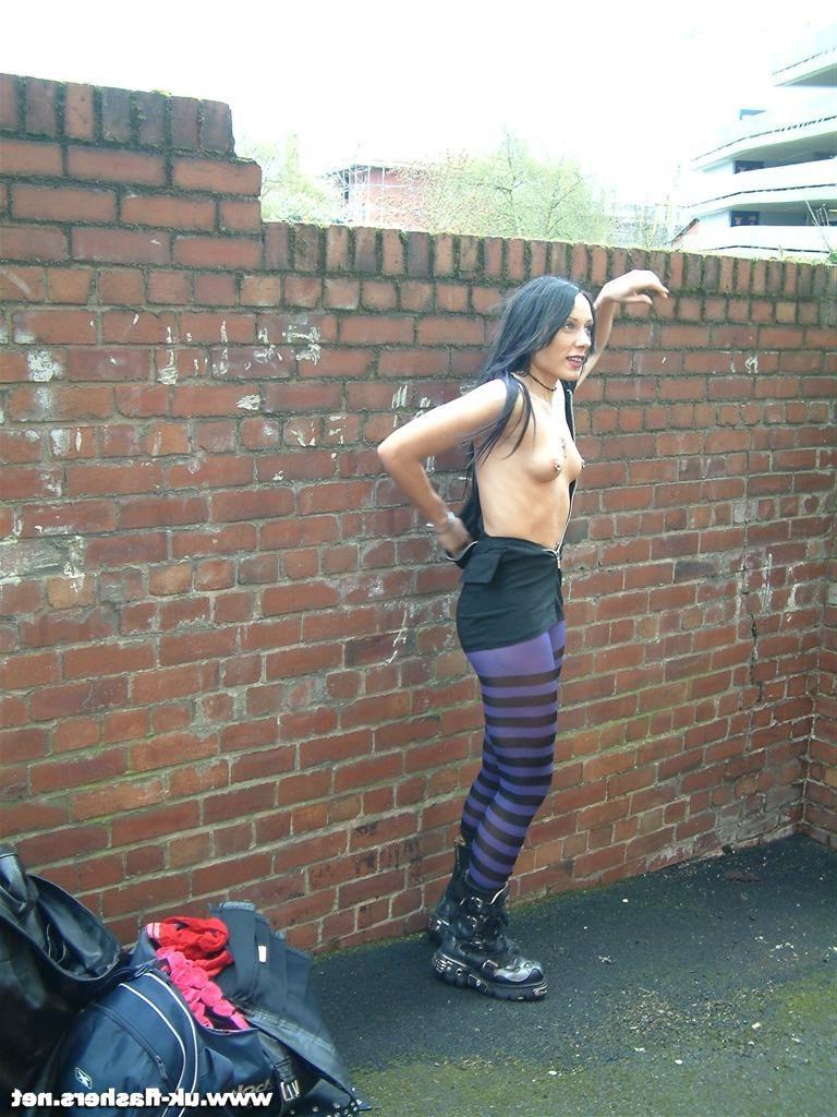 14P Sexy public flasher Isis in red stockings exposes tits
