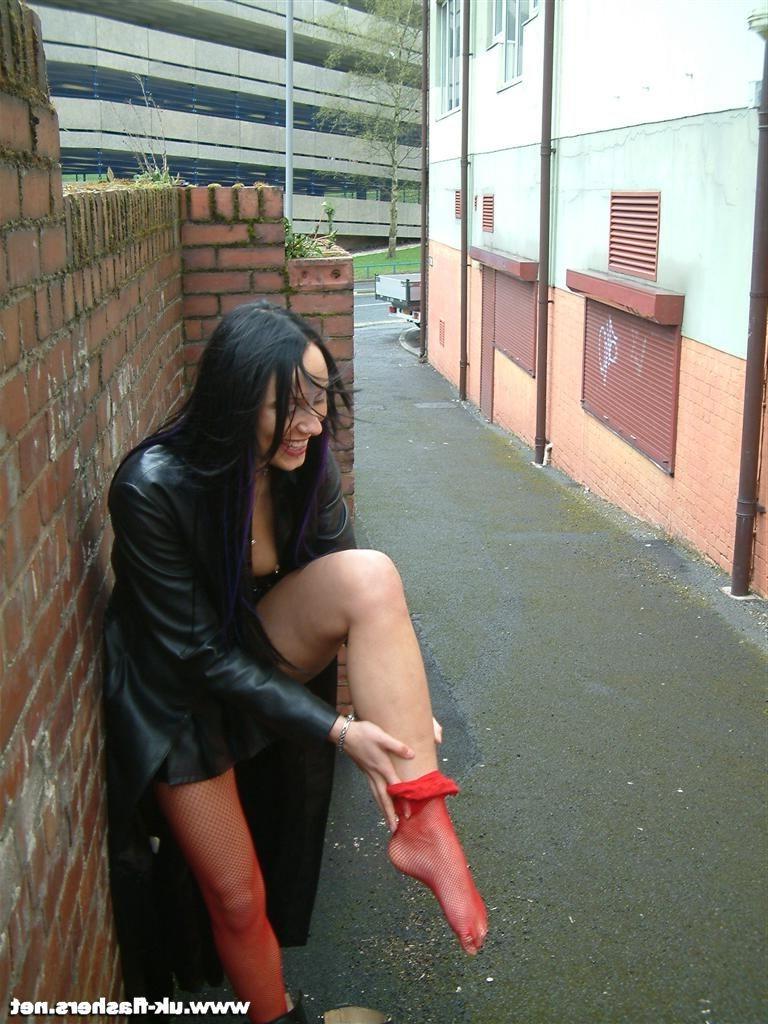 14P Sexy public flasher Isis in red stockings exposes tits