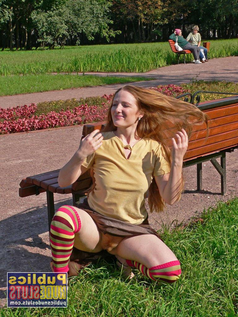 15P Very sexy redhead flashing in the park