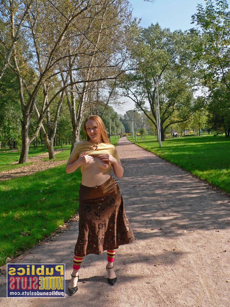 15P Very sexy redhead flashing in the park