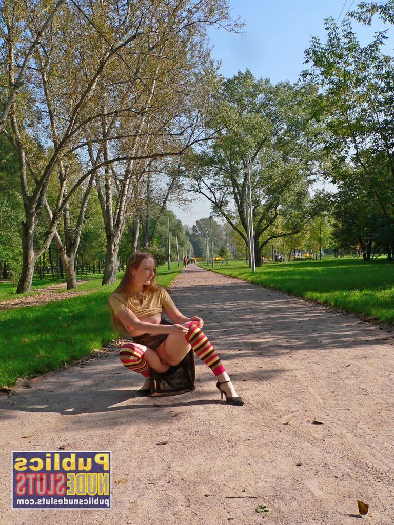 15P Very sexy redhead flashing in the park