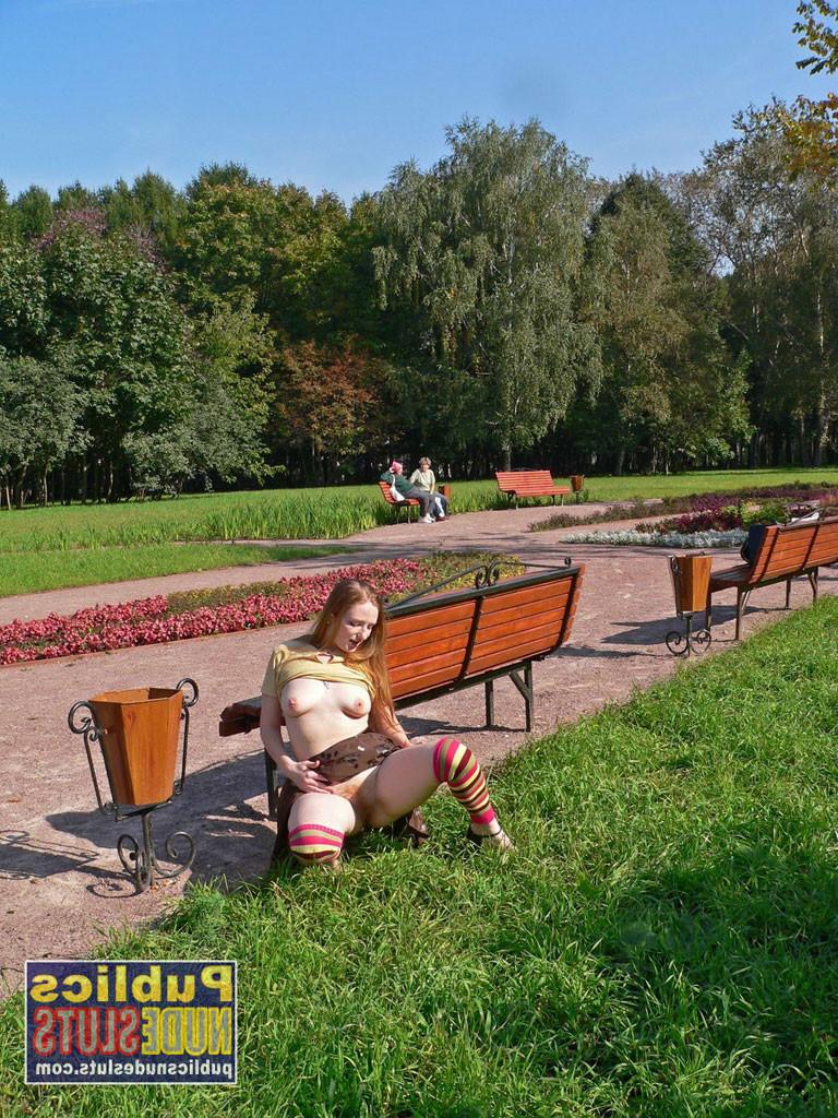 15P Very sexy redhead flashing in the park