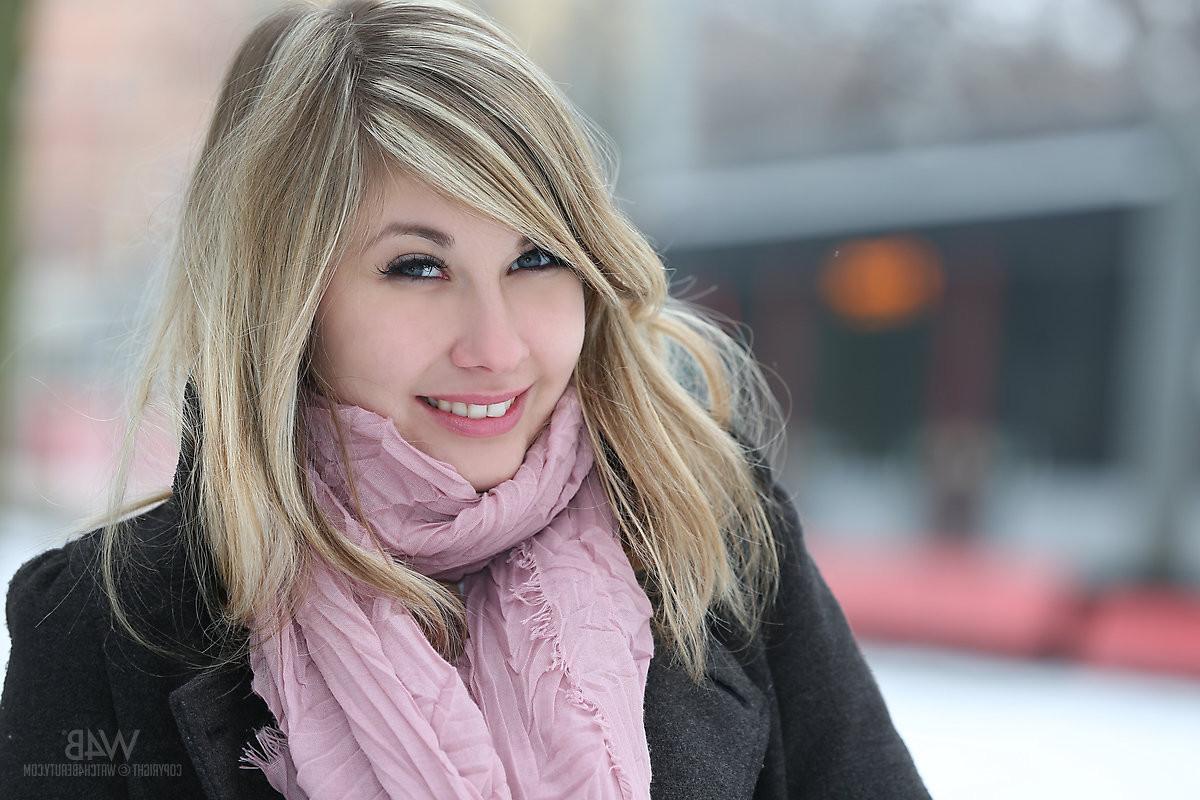 16P The snow is cold on her hard nipples as this cutie flashes her tits and pussy ou