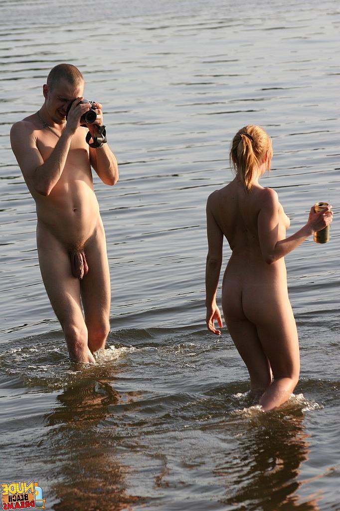 15P Wild couple making a nude beach video
