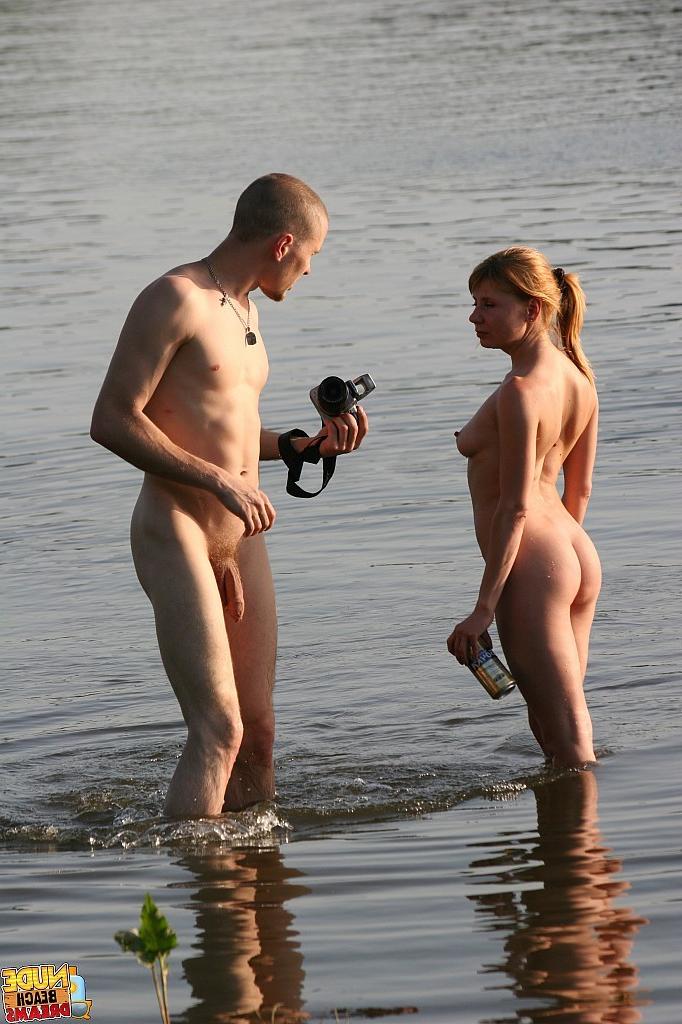 15P Wild couple making a nude beach video