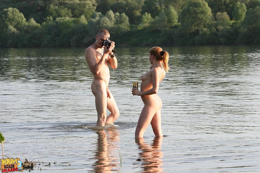 15P Wild couple making a nude beach video