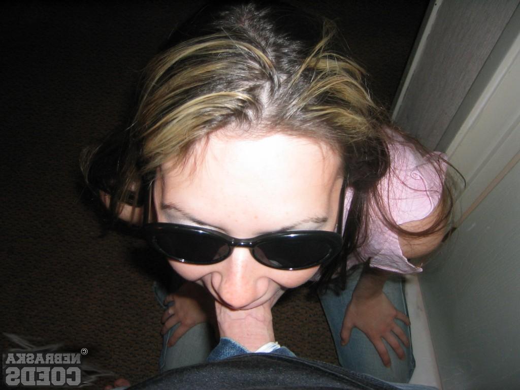 16P Nebraska Coed giving a blowjob at motel during spring break