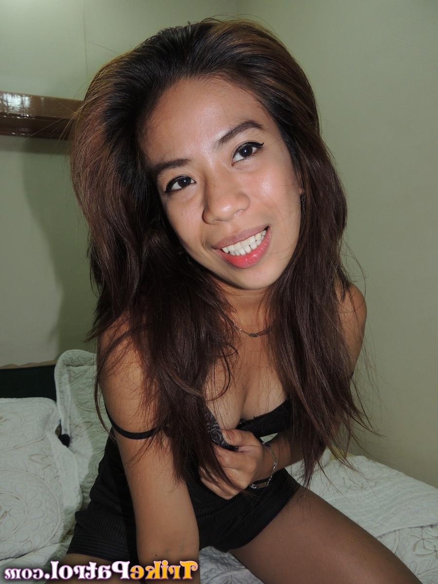 15P Horny Asian beach girl bares tits ass and pussy for tourist cam