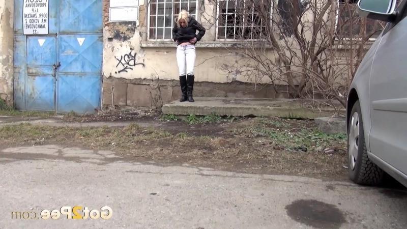 15P Pretty blonde girl is filmed peeing in public