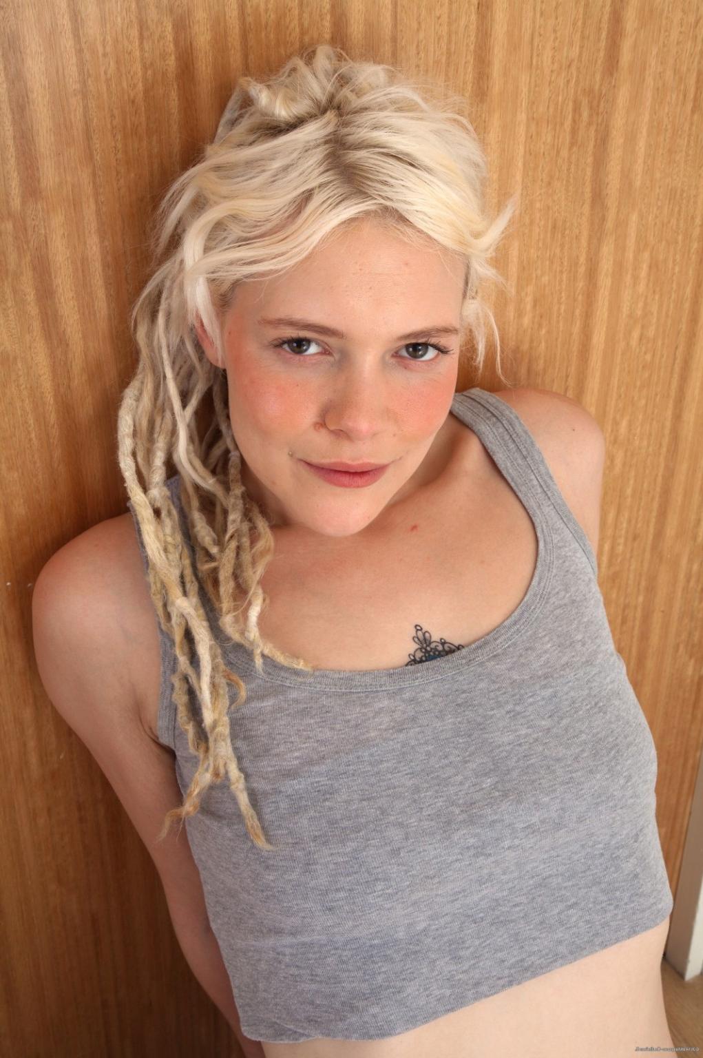 15P Natural hairy amateur blonde peeling off her jeans and panties
