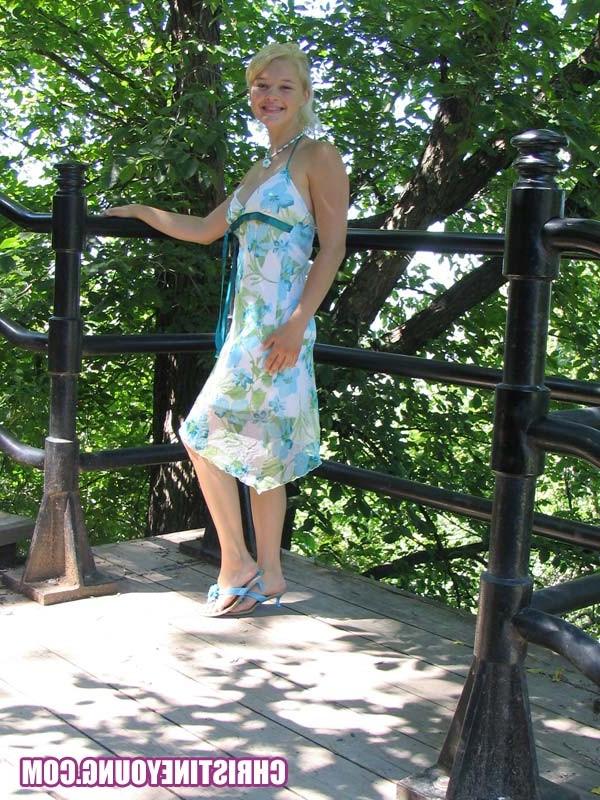15P Cute blonde sweetie Christine Young posing outdoors for you