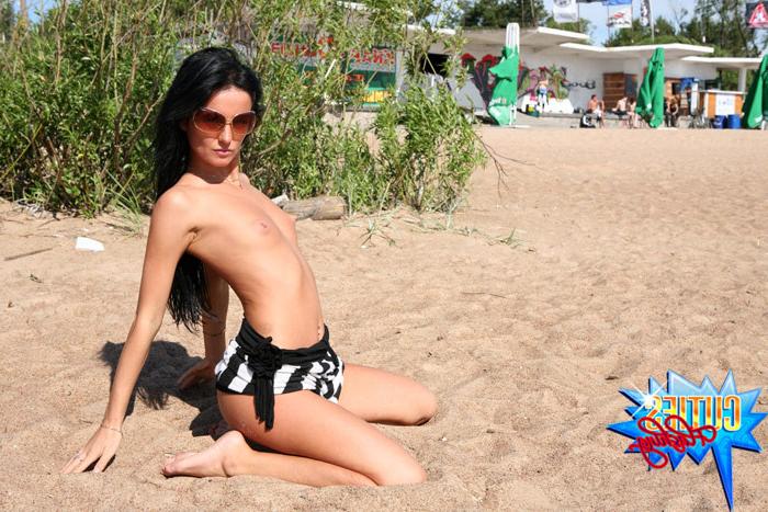 16P Babe shows her holes and little tits at the beach