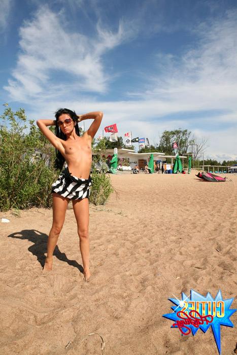 16P Babe shows her holes and little tits at the beach