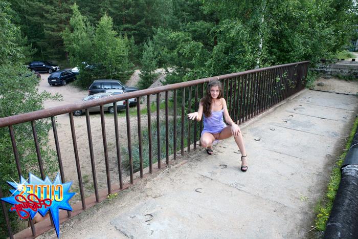 16P Perfect babe flashes her body over a parking lot