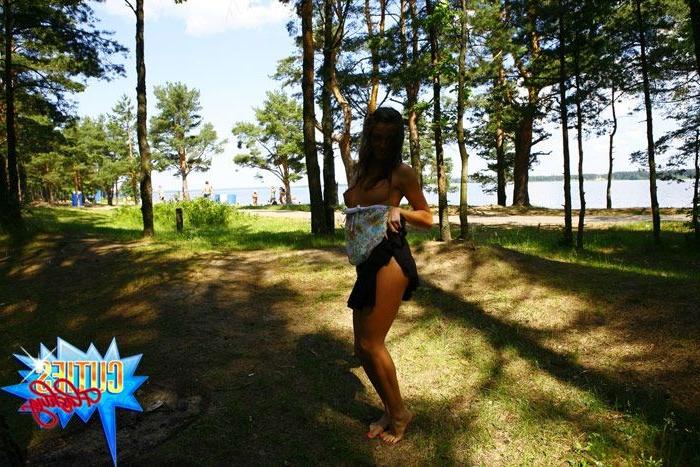 16P Gorgeous tart gets naked next to a crowded beach