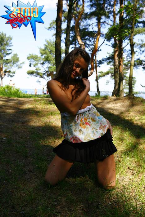 16P Gorgeous tart gets naked next to a crowded beach