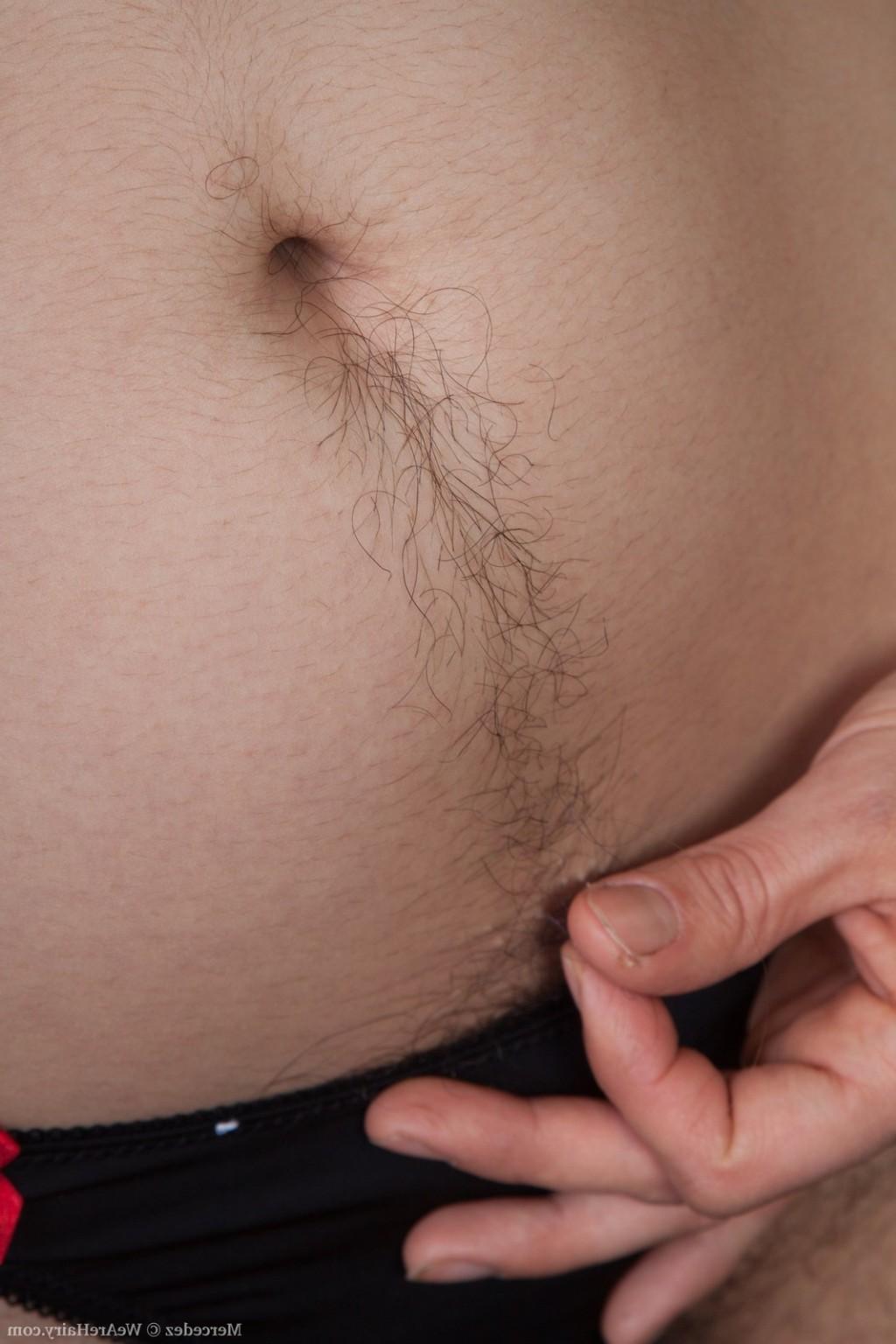 16P Mercedez shows her very hairy bush under her dress