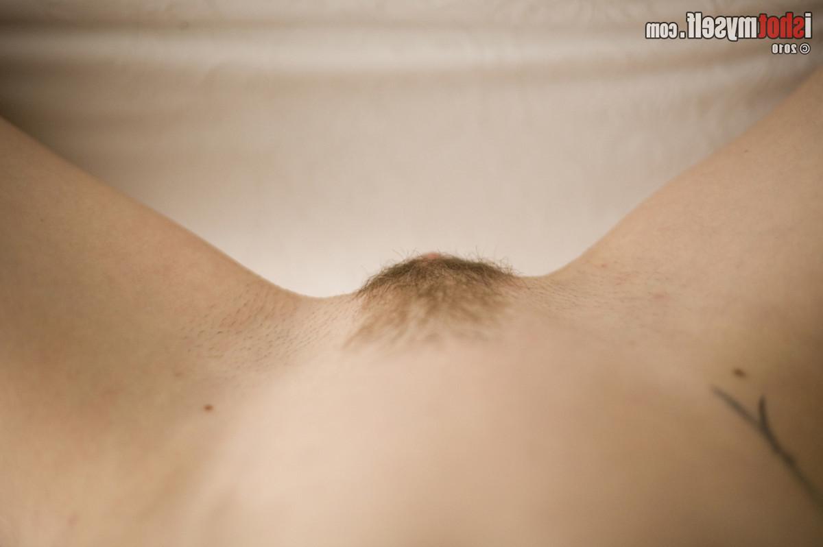 15P Hairy selfshot tattooed amateur on the bed