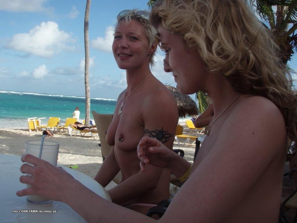 15P Amateur teen lesbian posing on topless beach with her girlfriend
