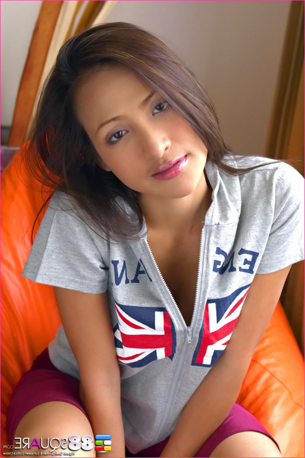 16P Asian pulls down her purple pants and exposes her sexy tattoo