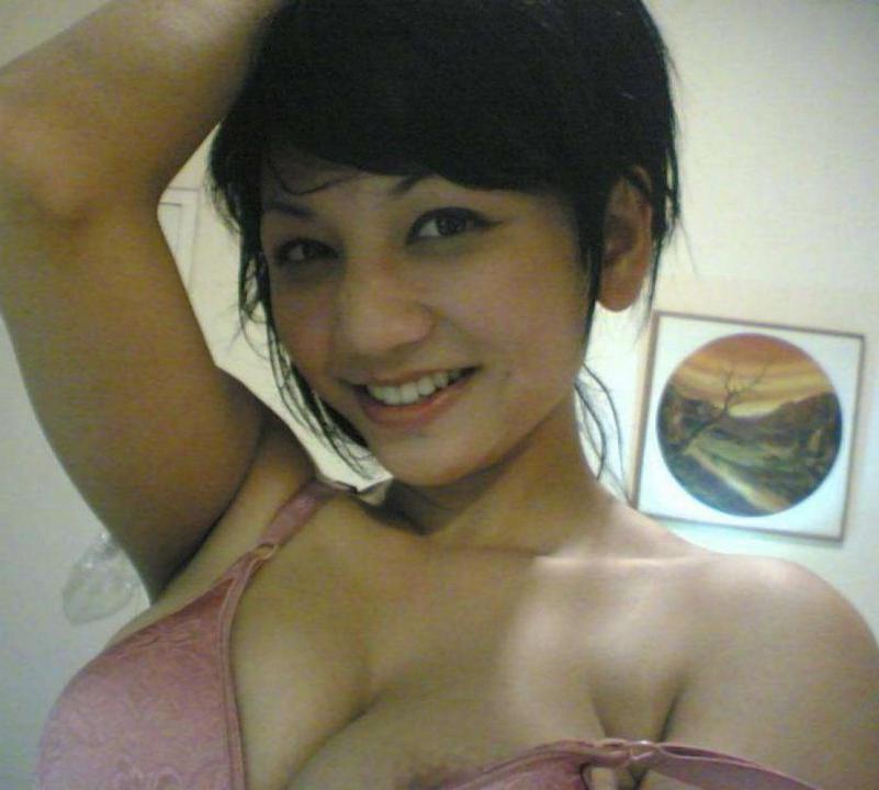 16P Asian coed goes full nude in couch shows squeezable tits