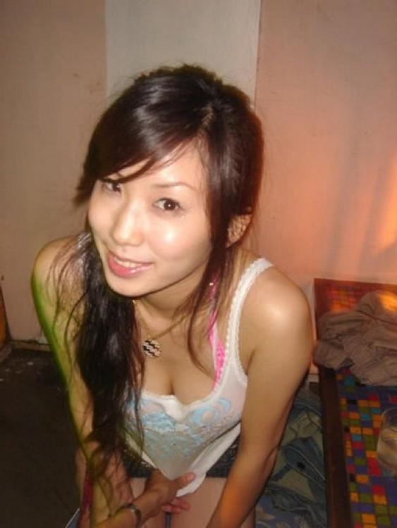 16P Asian coed goes full nude in couch shows squeezable tits