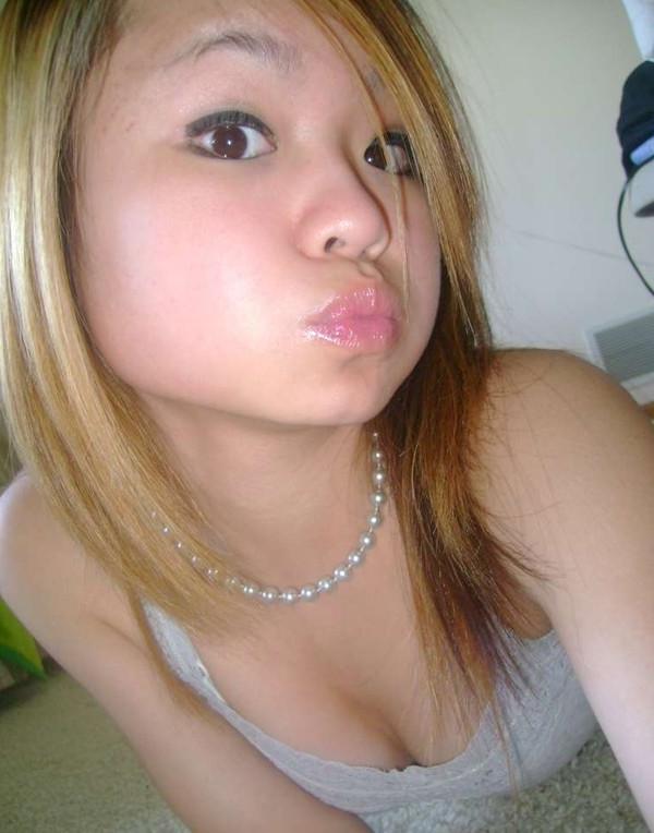 16P Asian coed goes full nude in couch shows squeezable tits