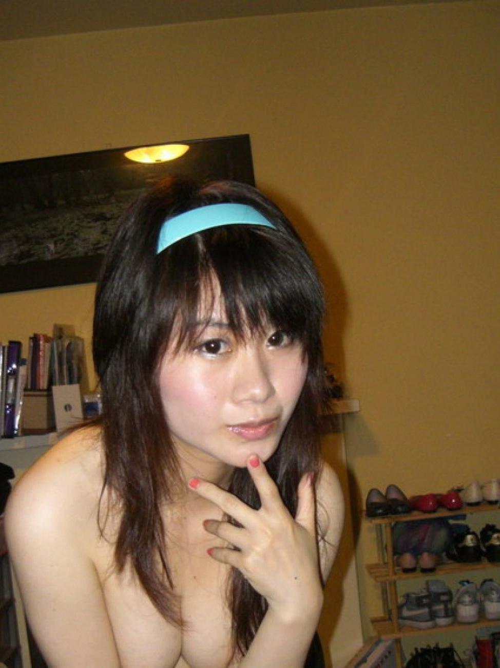 16P Asian coed goes full nude in couch shows squeezable tits
