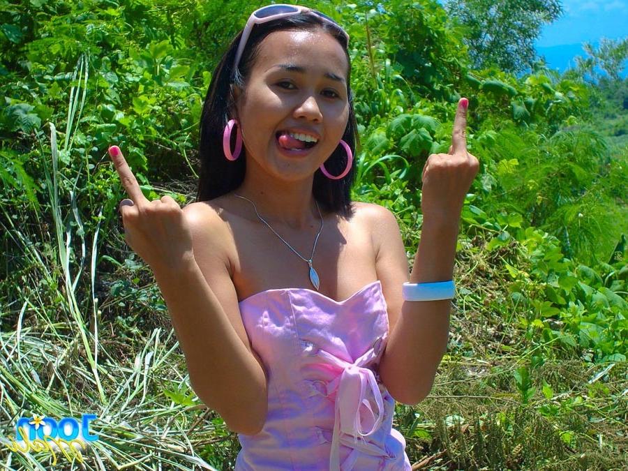 16P Cute asian teen outside