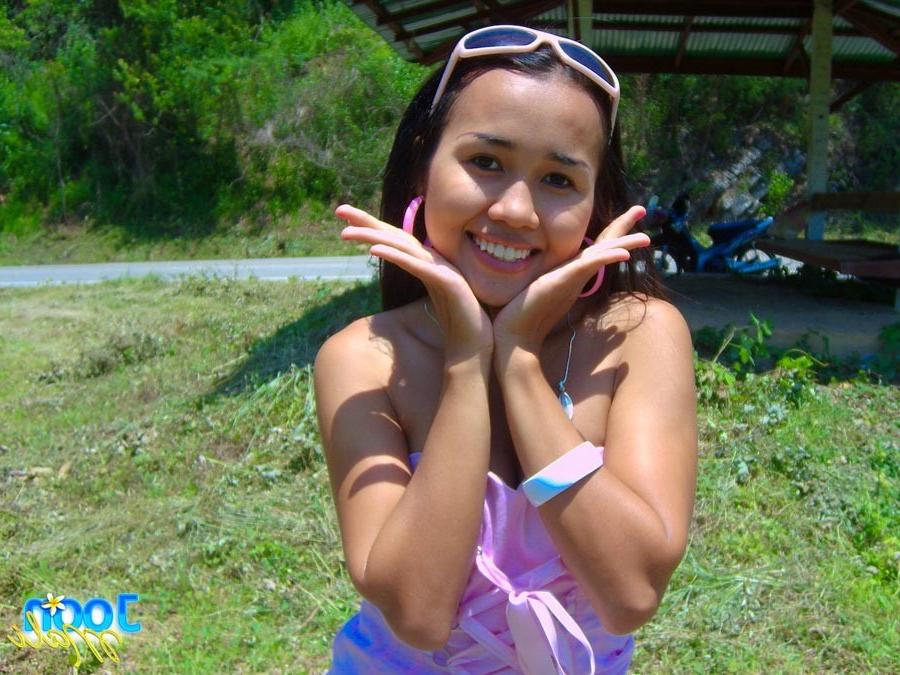 16P Cute asian teen outside