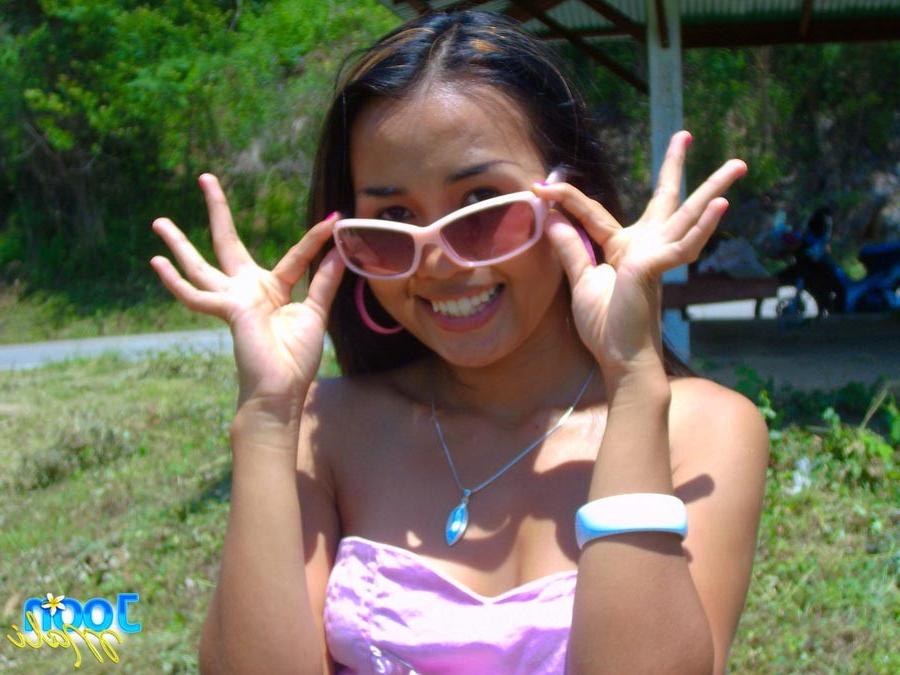 16P Cute asian teen outside