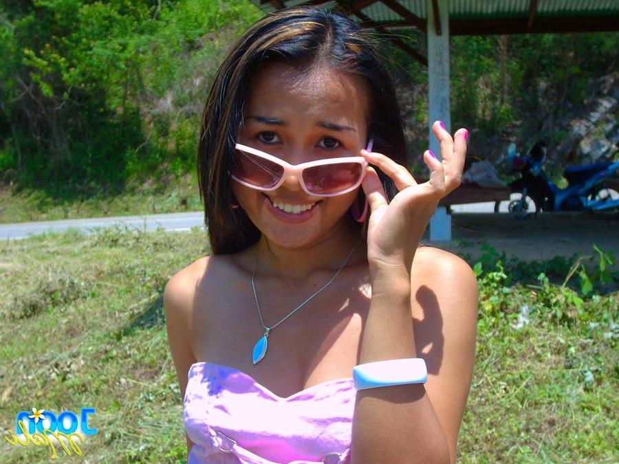 16P Cute asian teen outside