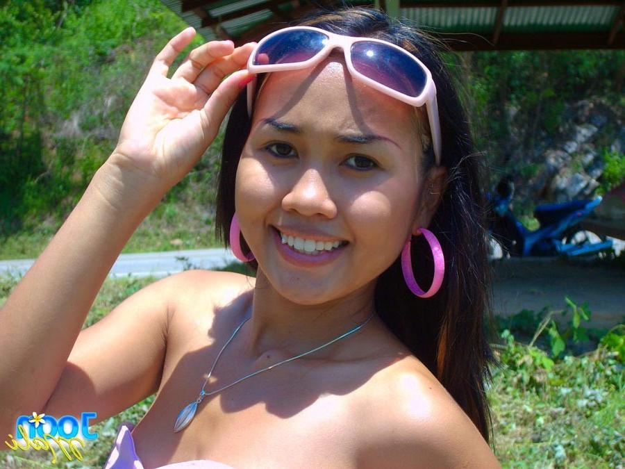 16P Cute asian teen outside