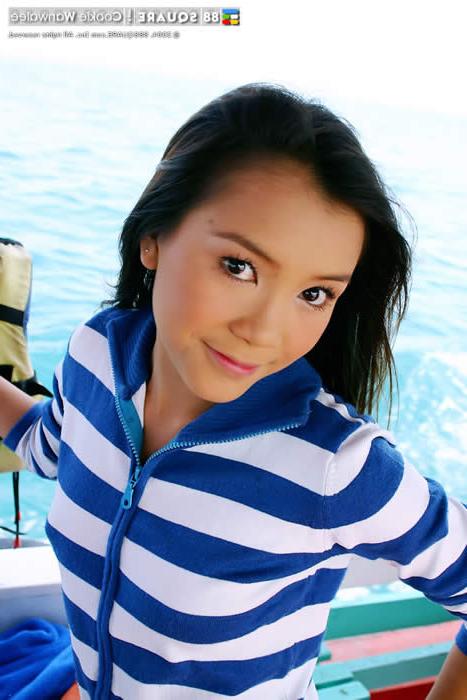 15P Young asian wearing a tiny bikini