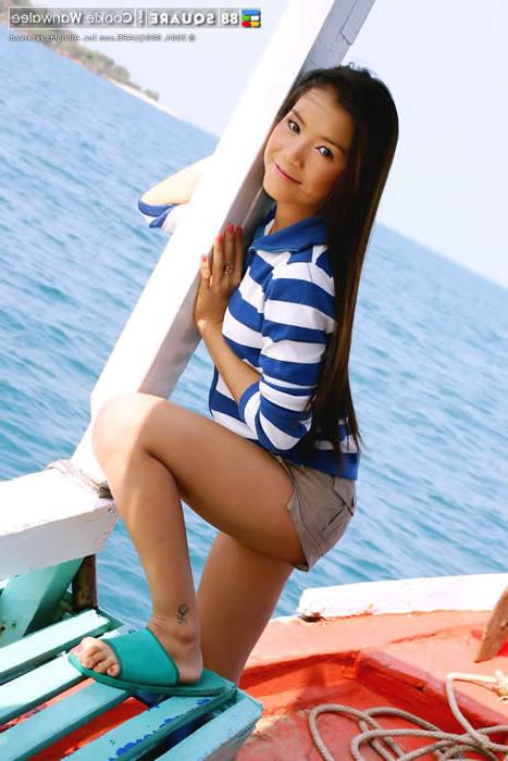 15P Young asian wearing a tiny bikini