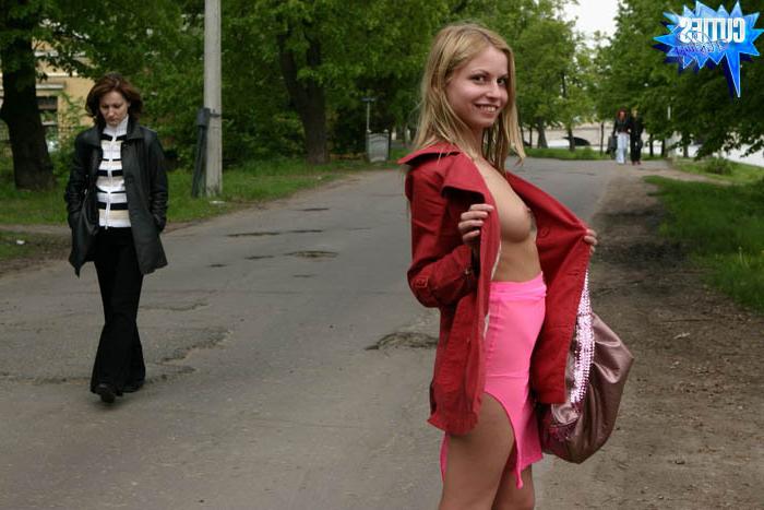 16P Little flasher shows her heavy jugs outdoors