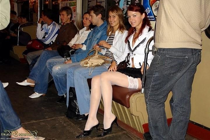 12P Redhead teen in white stockings at a public place