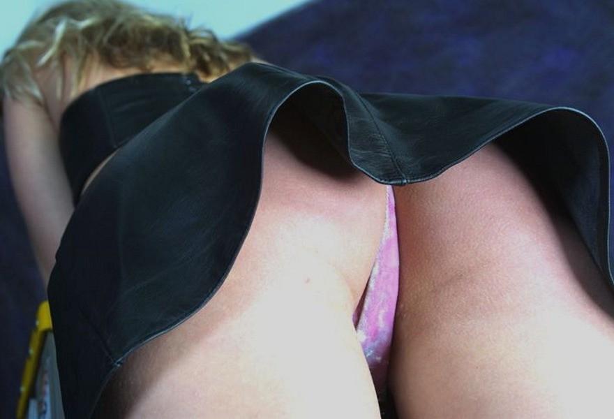 16P Upskirt voyeur panty peeks at blonde babe in short leather skirt
